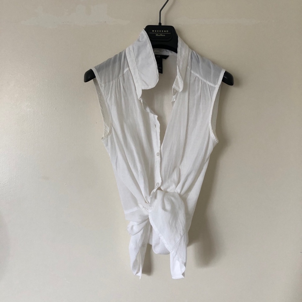 White Sleeveless Button Up